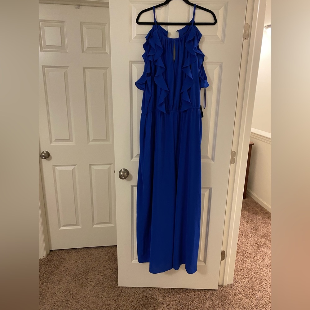 Size 20 lane Bryant royal blue romper with thin sleeves. New with tags